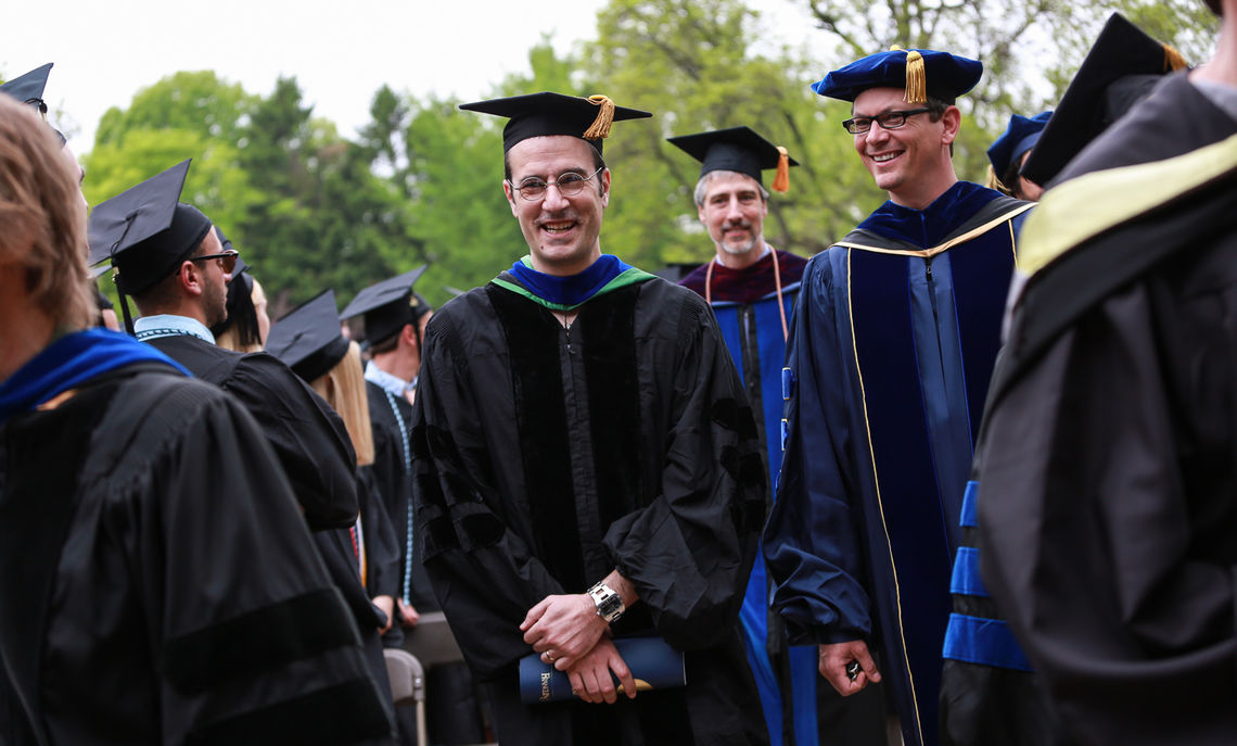 F&M faculty members assemble on Hartman Green to offer support and congratulations to the Class of 2015.