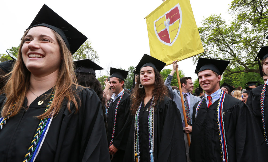 Members of Bonchek College House make their way to their seats during the processional.