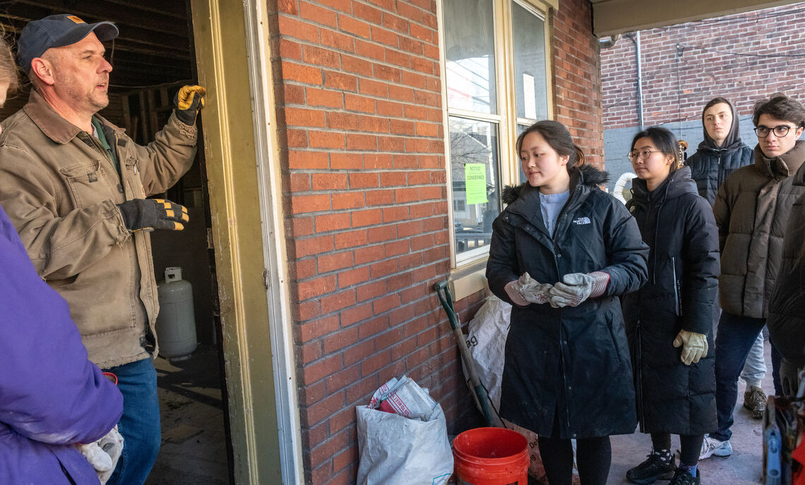 F&M's Catastrophic Relief Alliance (CRA) receive a tour and brief history of the property they worked on.