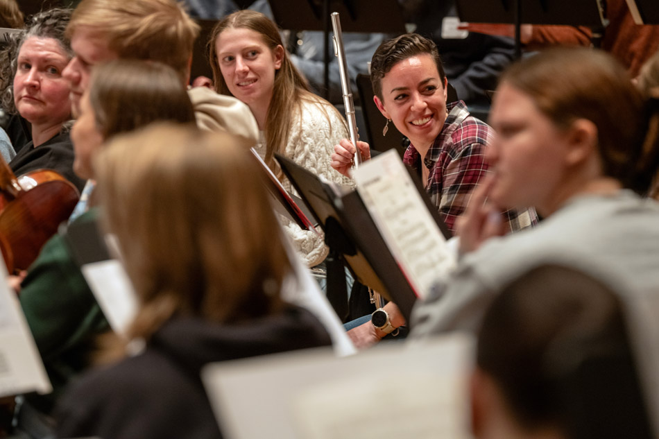 Brian Norcross leads the alumni orchestra rehearsal