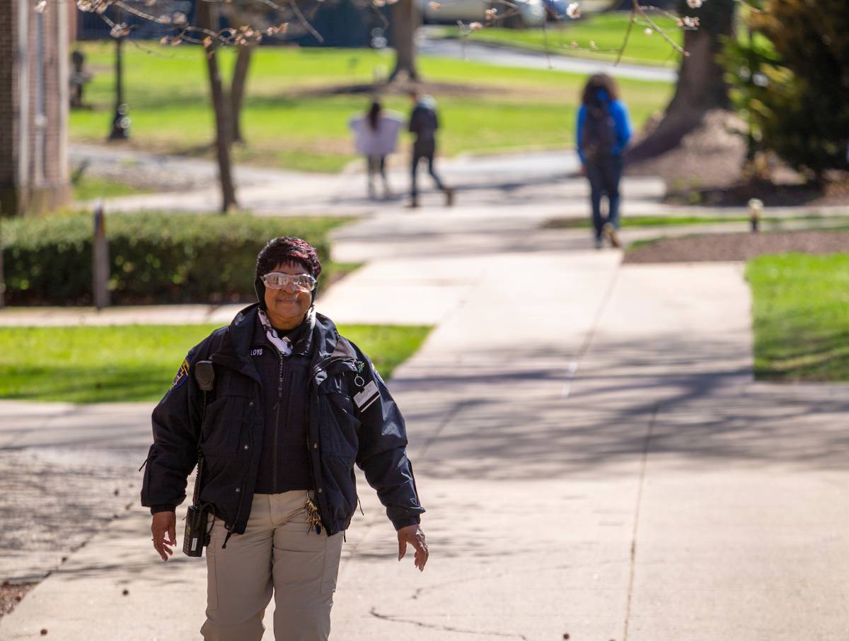 Public Safety Security Officer Imogene Elliott-Lloyd walks through campus.