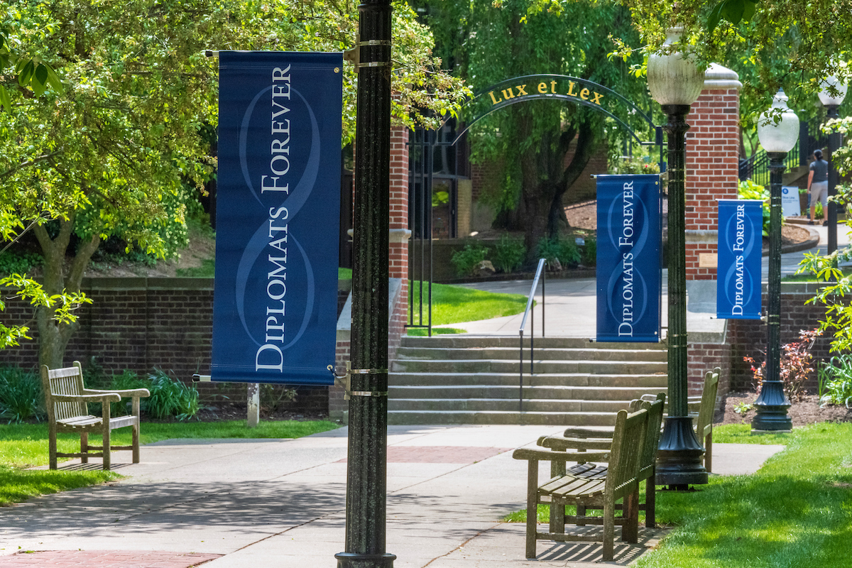 Diplomats Forever banners across campus