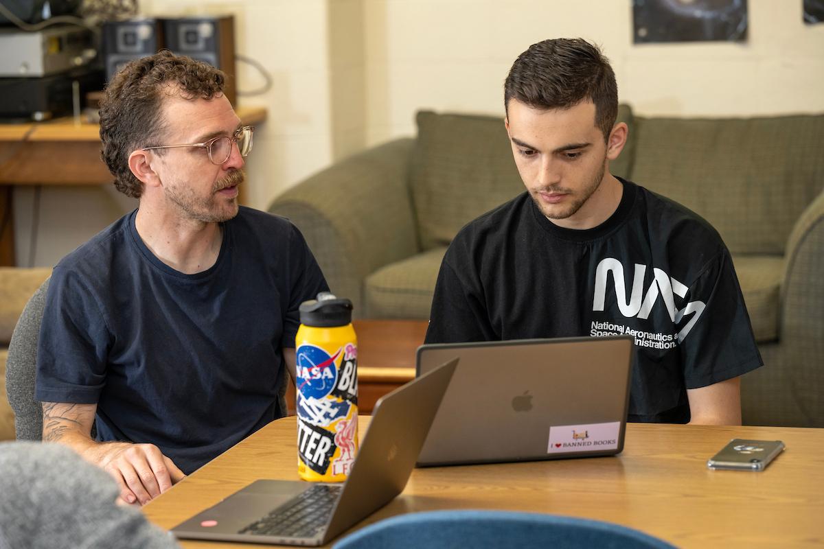 Menelaos Raptis and Associate Professor of Physics Ryan Trainor