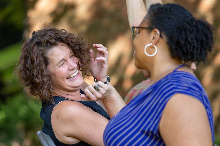 Faculty and professional staff enjoying musical chairs on campus