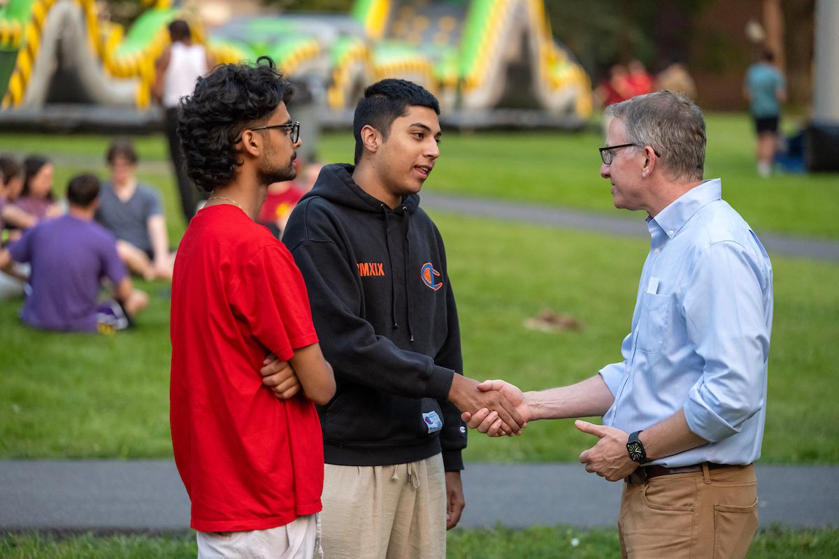 President Andrew "Andy" Rich with F&M students at the all-campus carnival.