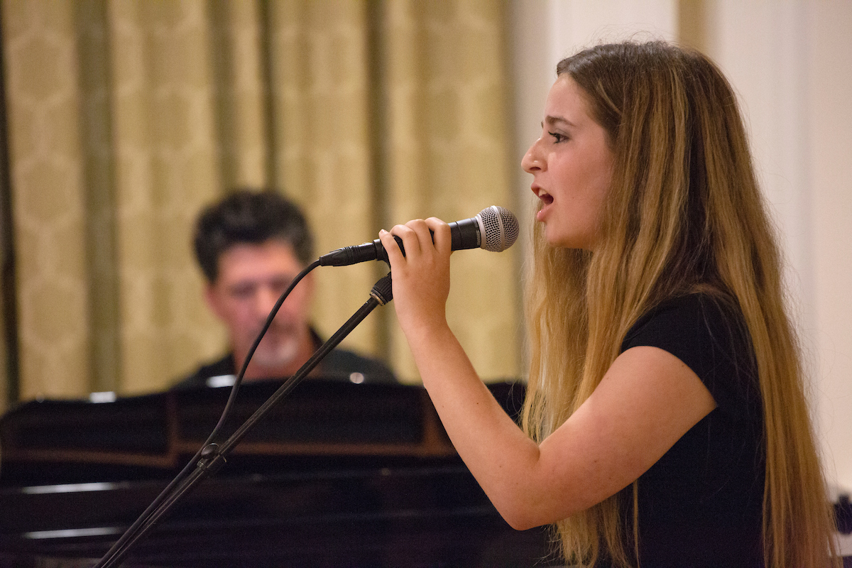 Student Samantha Schmill of Roschel College House performs during F&M Idol in October 2020. (Photo by Deb Grove) 