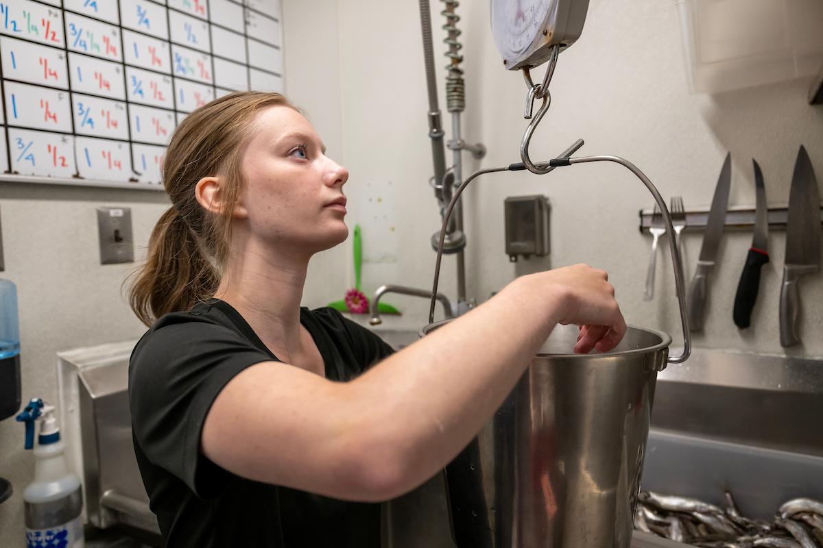 Curry’s responsibilities include cleaning and maintaining all animal habitats and preparing diets. 