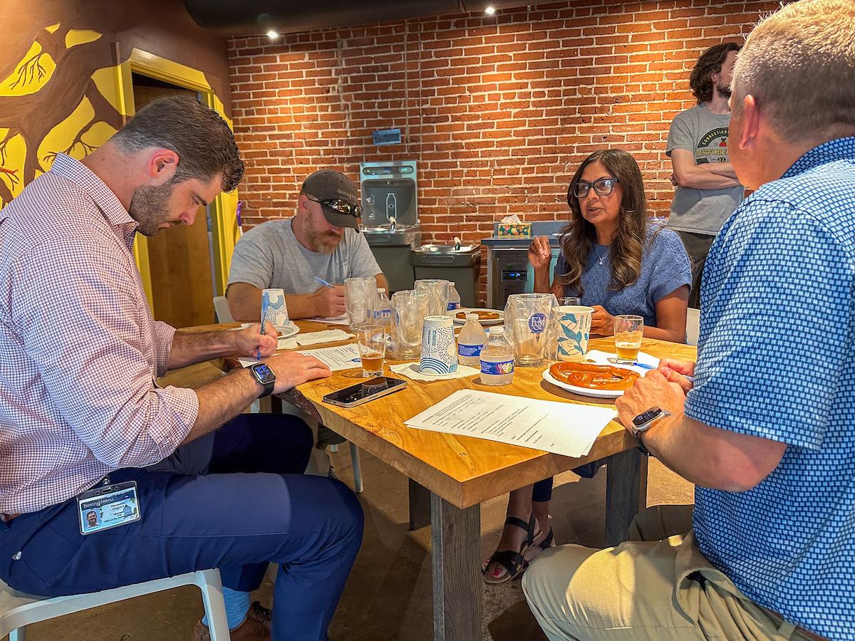 F&M staff evaluate beers brewed as part of F&M’s first-ever Brewing Science course.