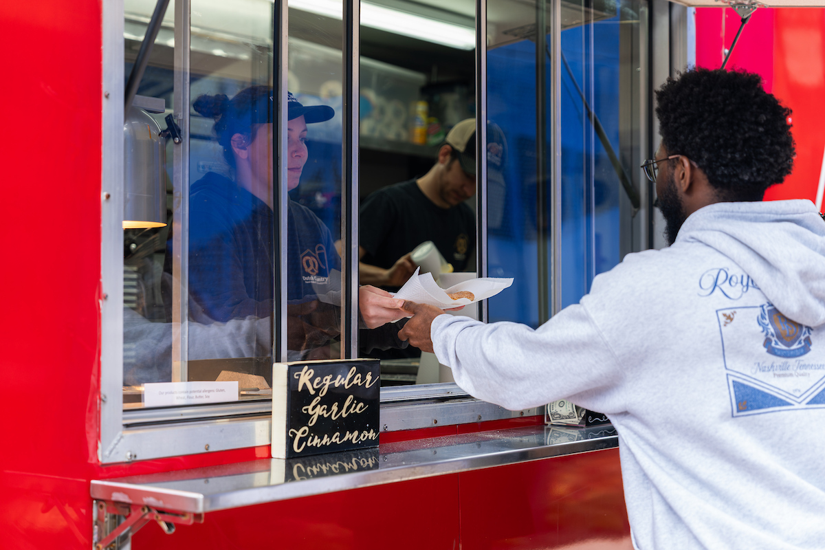 A student at a food truck.