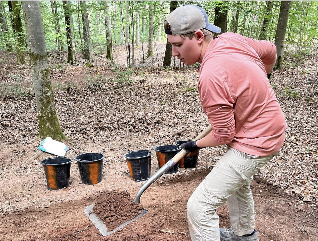 Vogel helping to excavate the crash area.