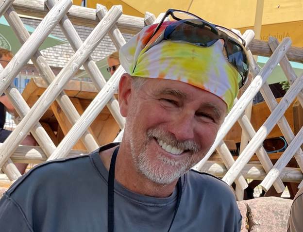 A photo of Tim Bechtel smiling. 