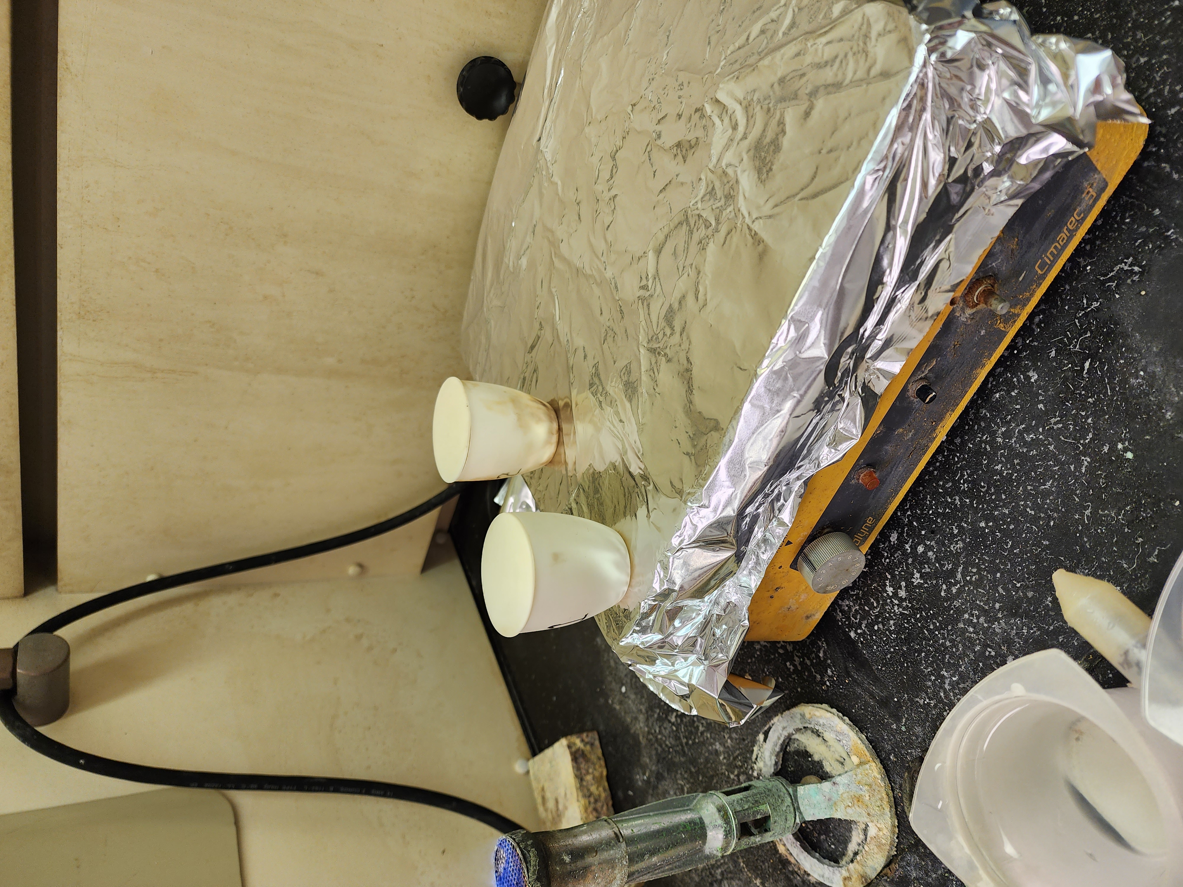 Crucibles remain at a low boil for 10 minutes to completely dissolve rock powder