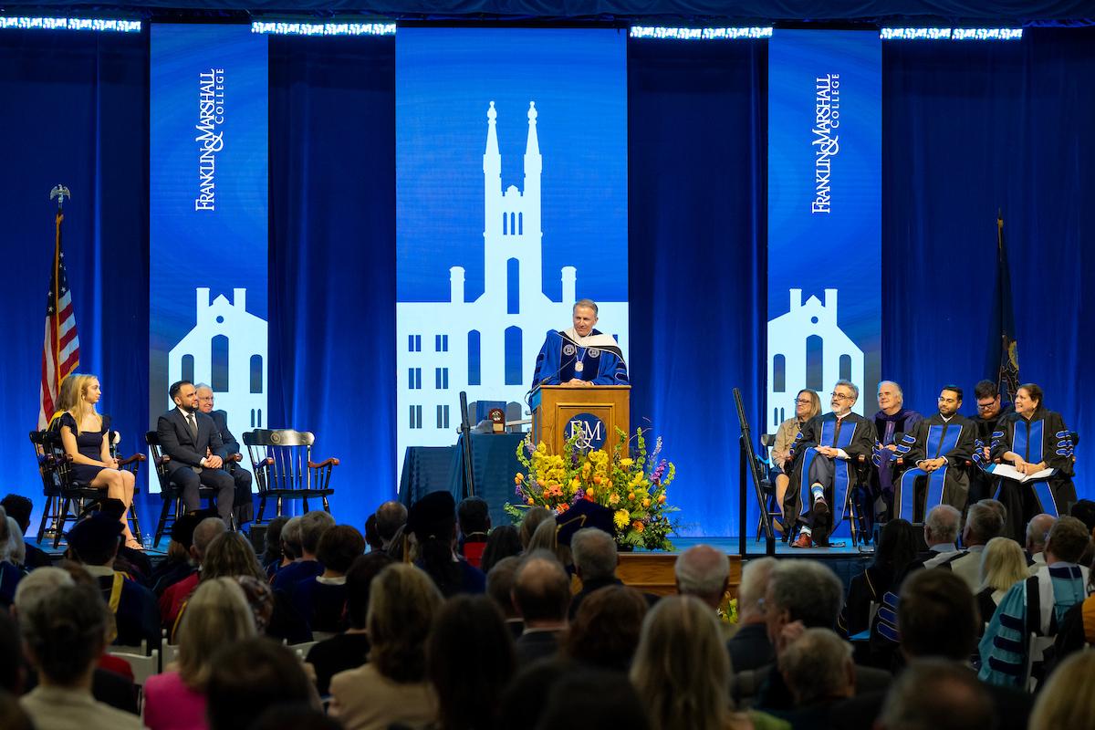 F&M President Andrew Rich addresses ceremony guests while wearing the presidential medallion. (Photo by Deb Grove)