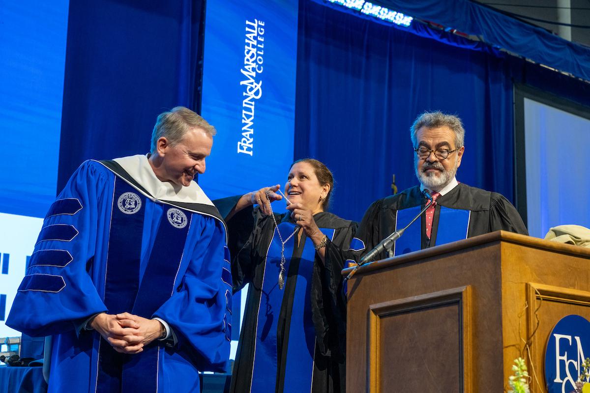 Susan Kline Klehr ’73, P ’12, presents Andrew Rich with the presidential medallion. (Photo by Deb Grove)