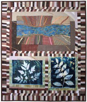 art quilt with images of plants 