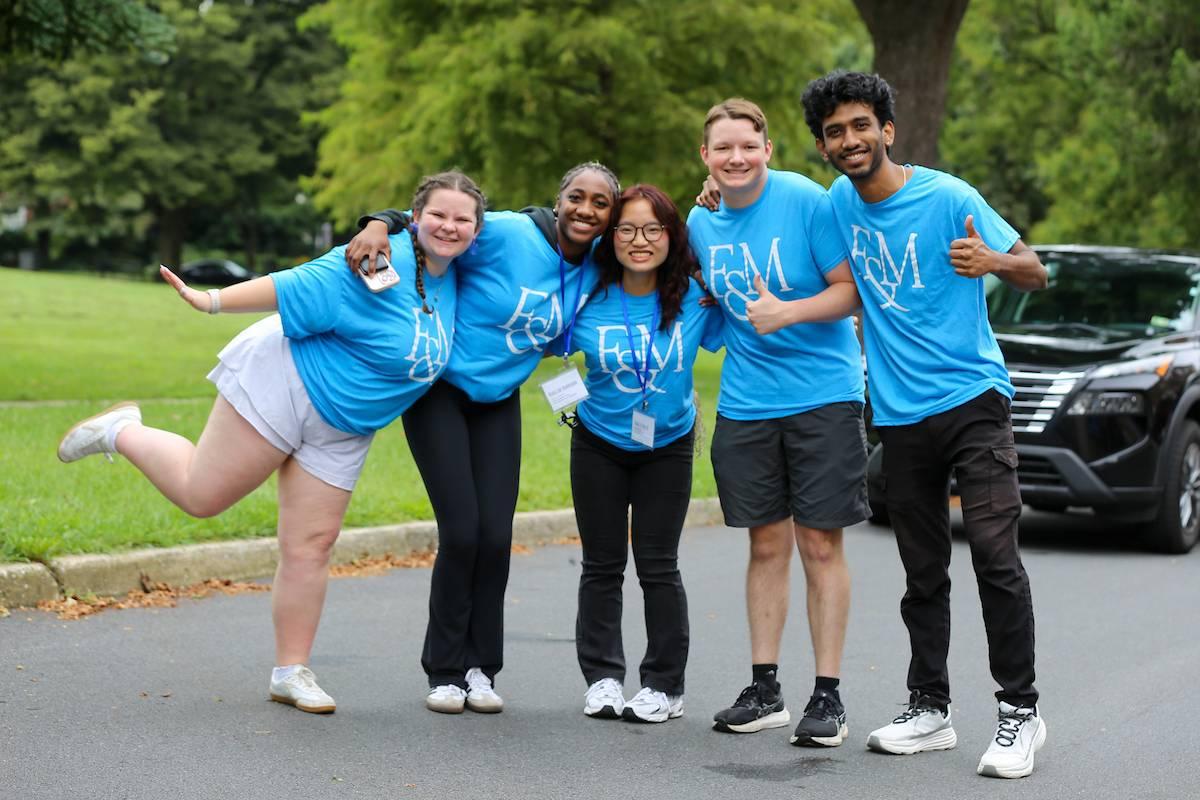 Returning students volunteer at move-in day. 