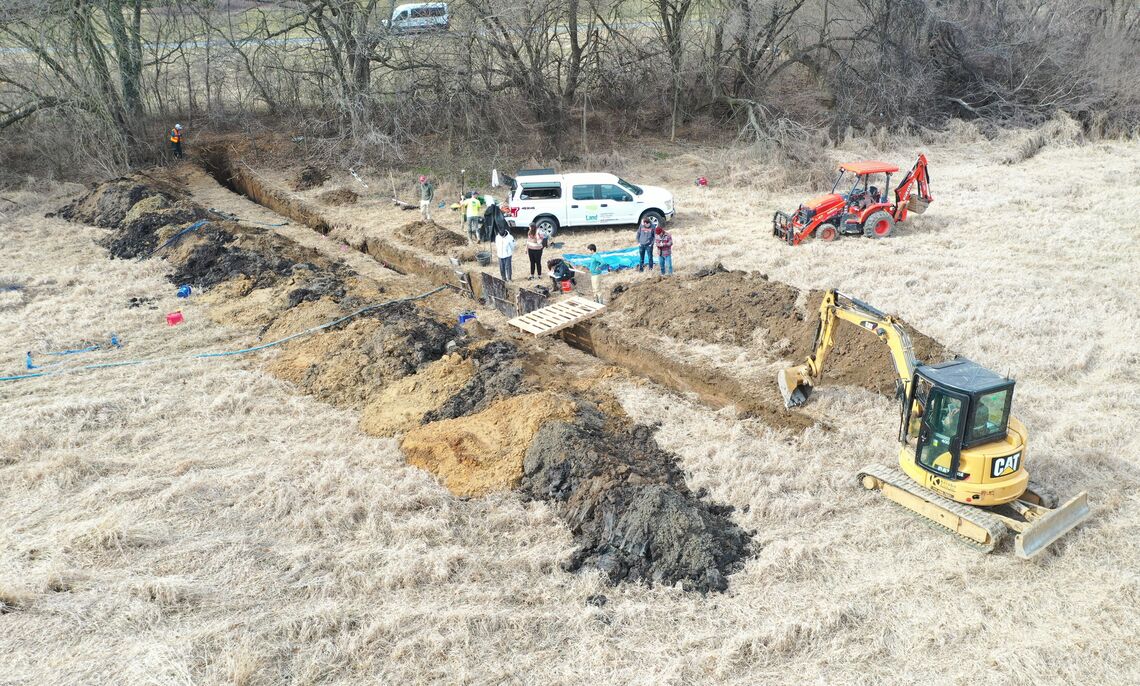 An aerial view of trench digging.