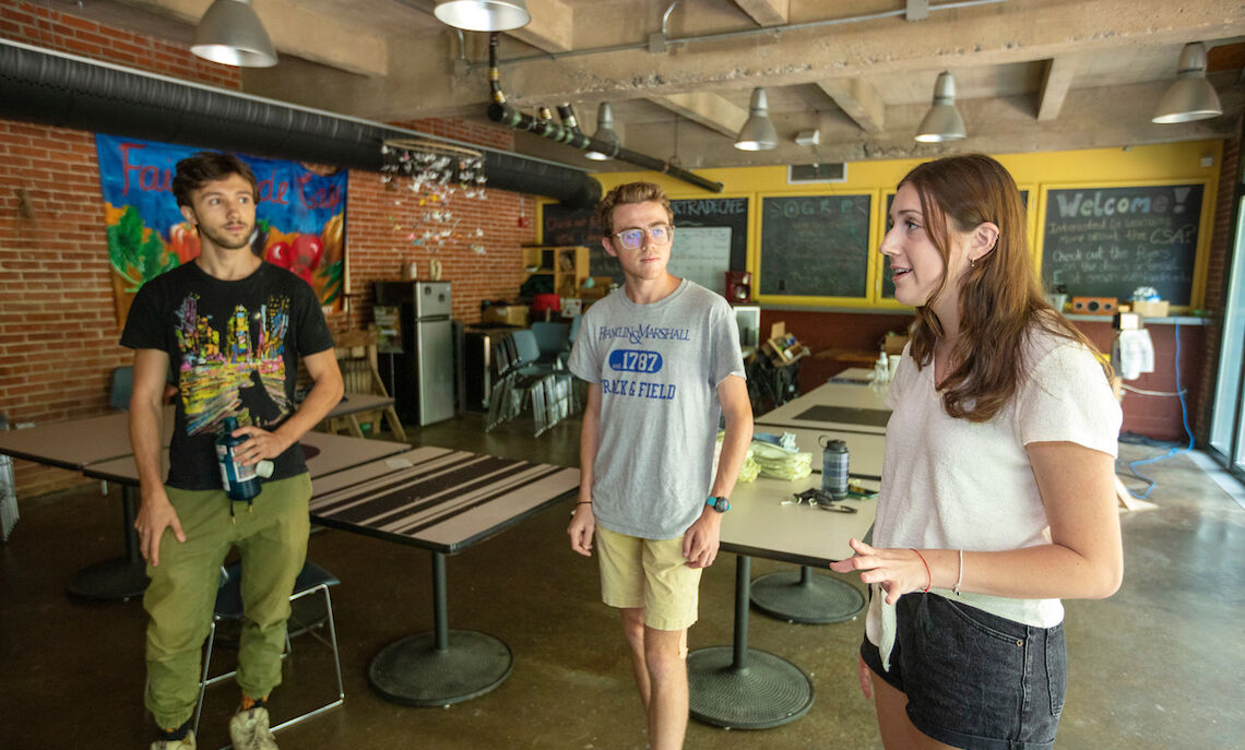 Max Sano '22, Bennett Wasch '23 and Maddie Huelbig '22 discuss their research project in the Center for the Sustainable Environment