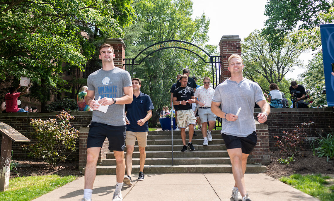 Graduating seniors take a final stroll through campus as members of the Franklin & Marshall community join them to celebrate their four years of achievement.