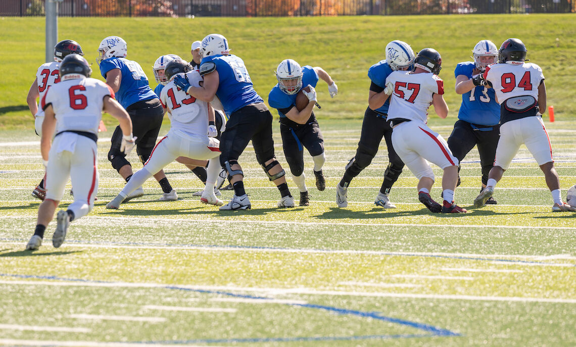 The Diplomat football team takes on the Dickinson Red Devils, thrilling spectators with a 28-17 victory.