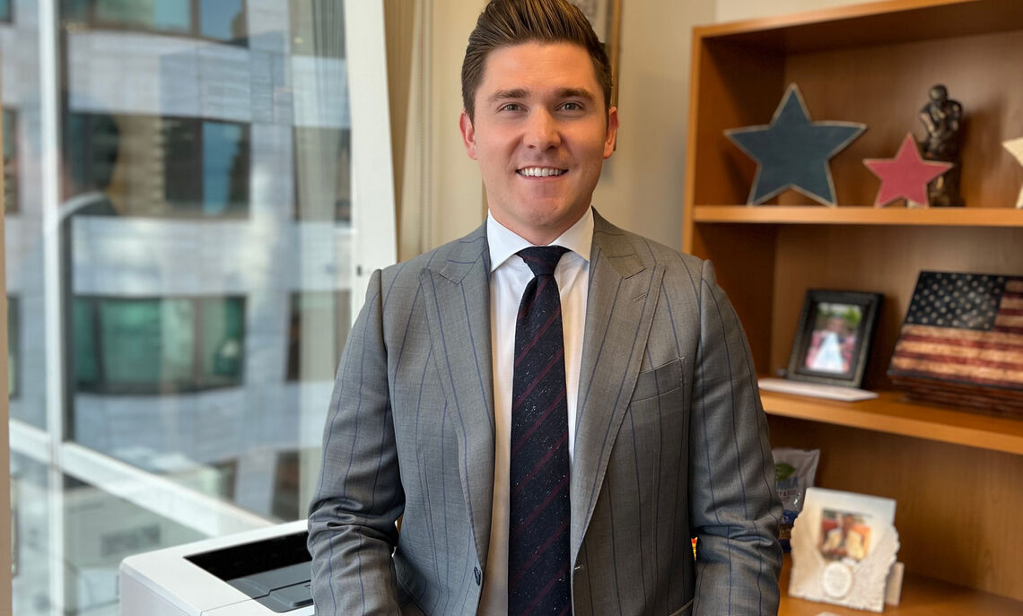 Schneider, in his Boston law office, says of alumni mentoring and opportunity, “So many times it really is who you know, not what you know.”
