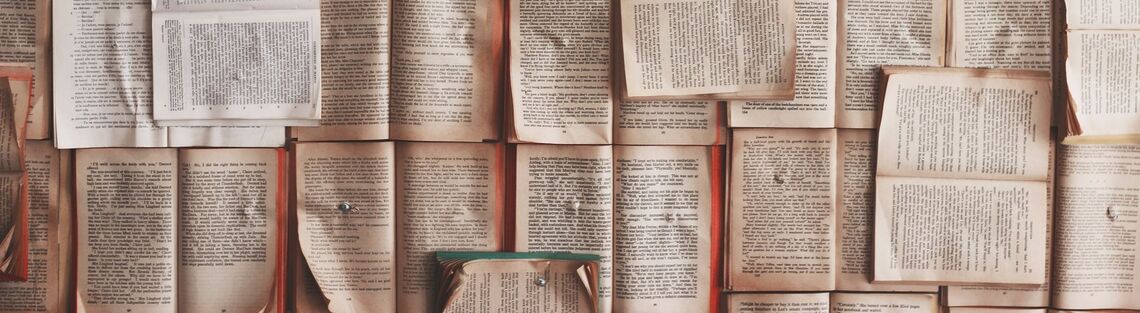 Books stacked on top of one another