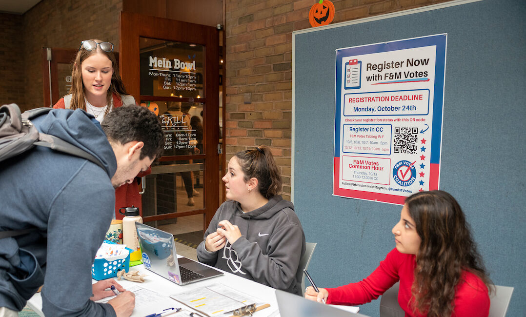 Liz Joslin '24 (standing in background) spent her summer and fall as a communications intern for Pennsylvania Governer-Elect Josh Shapiro's campaign.