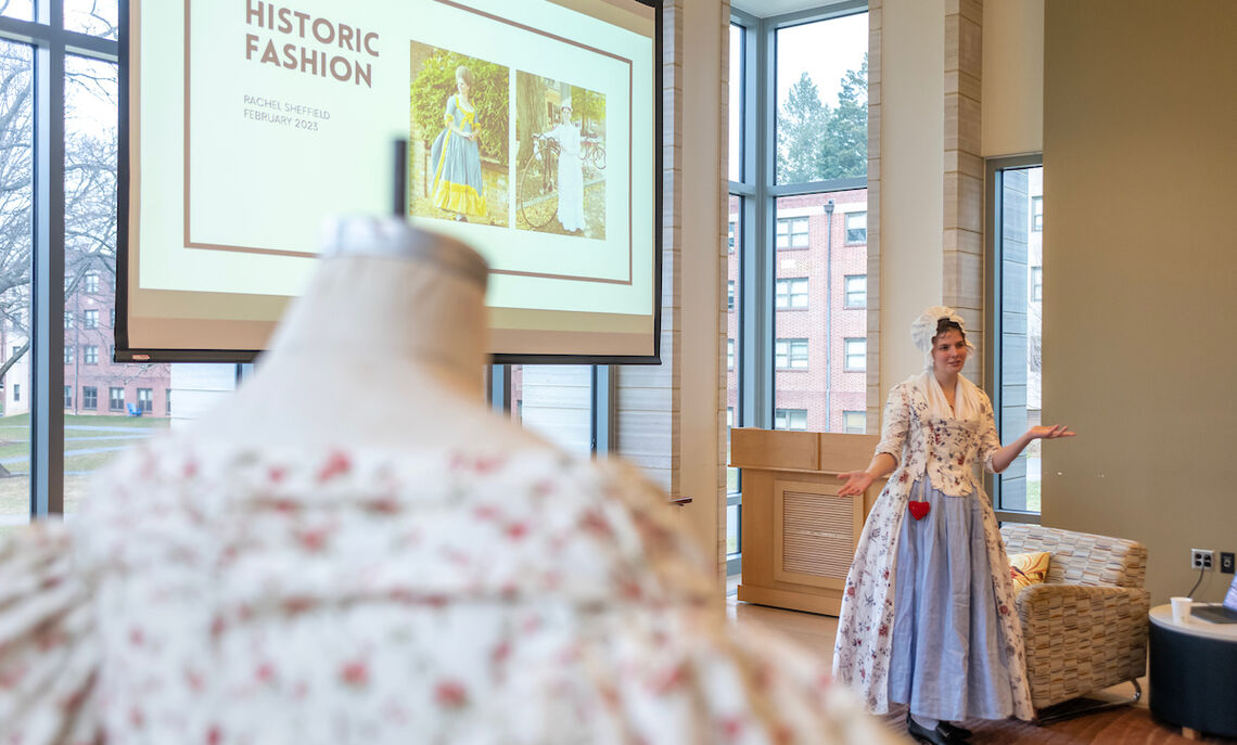 Rachel Sheffield '20, lead interpreter and historic clothing coordinator at First State Heritage Park in Dover, Del., presented her designs to students in Brooks College House.