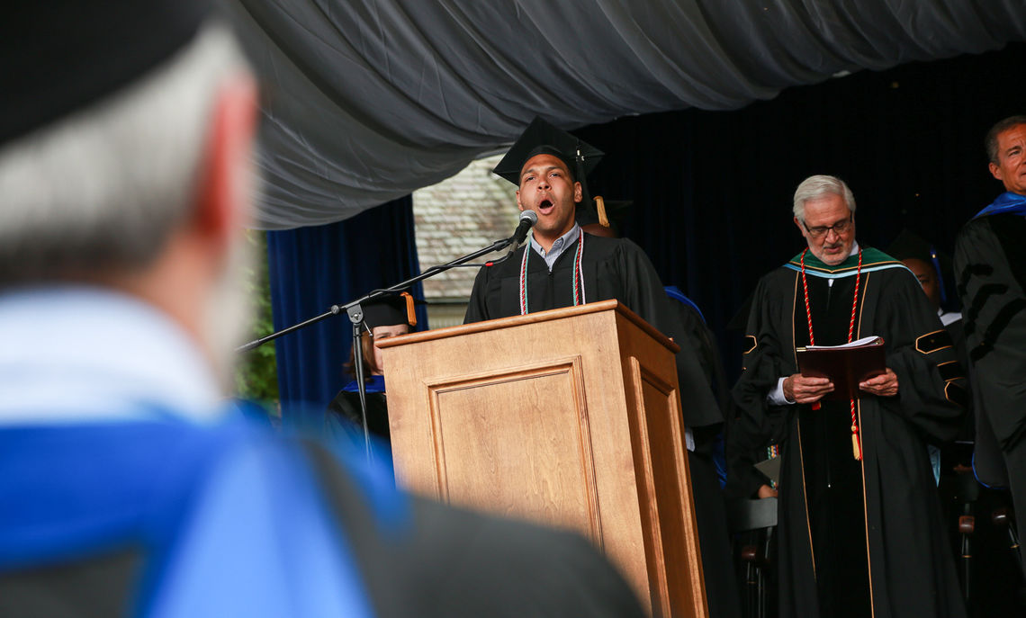 Baritone Paul 'Babe' Berry belts out the alma mater to close out the ceremony.