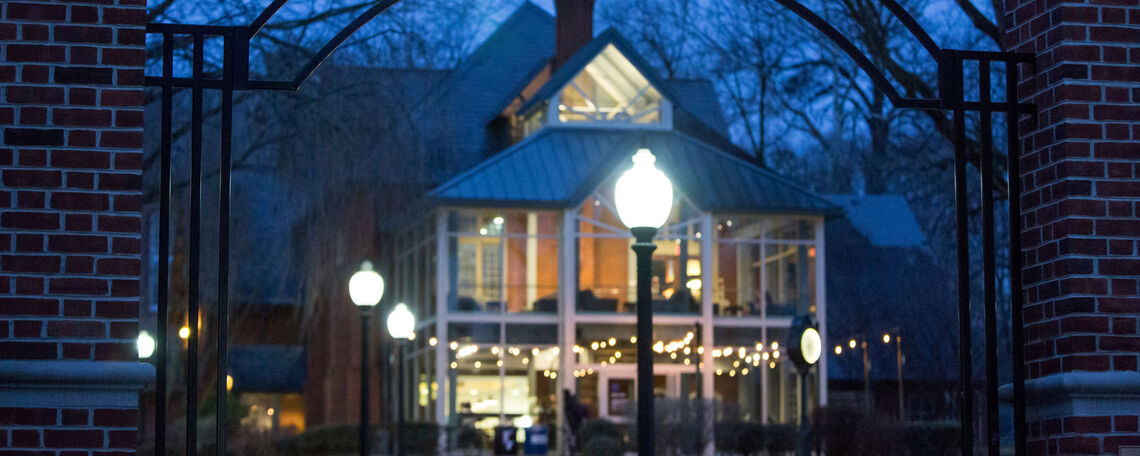 Students gather in the warm glow of Blue Line cafe during an evening in early March.