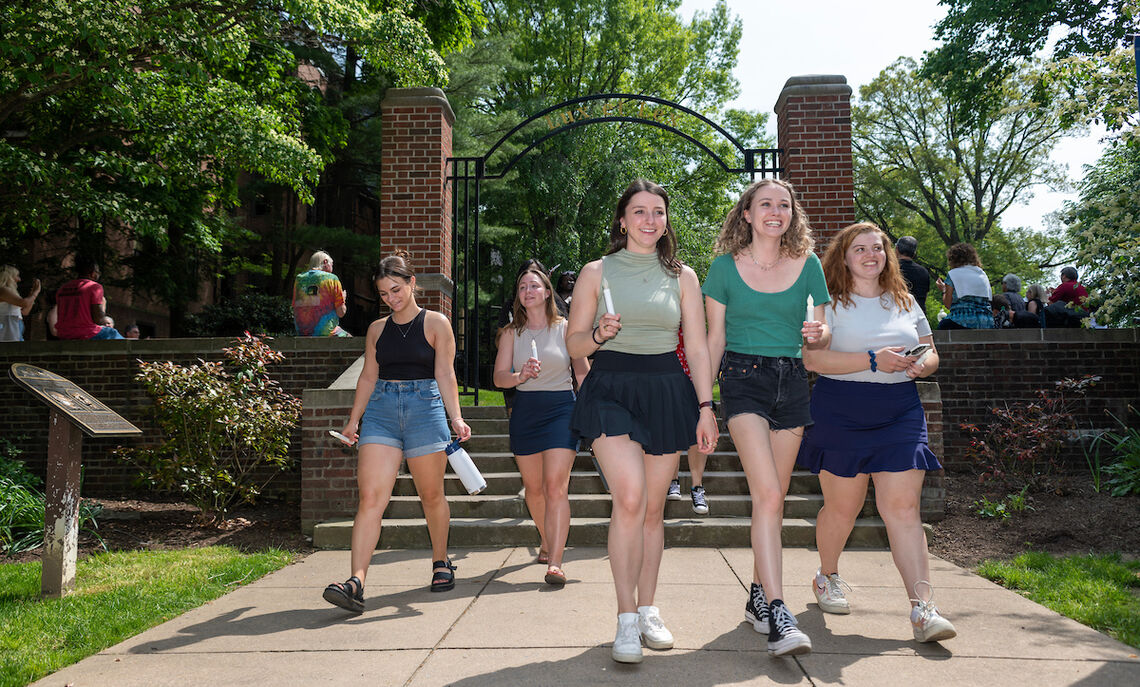 Graduating seniors take a final stroll through campus as members of the Franklin & Marshall community join them to celebrate their four years of achievement.