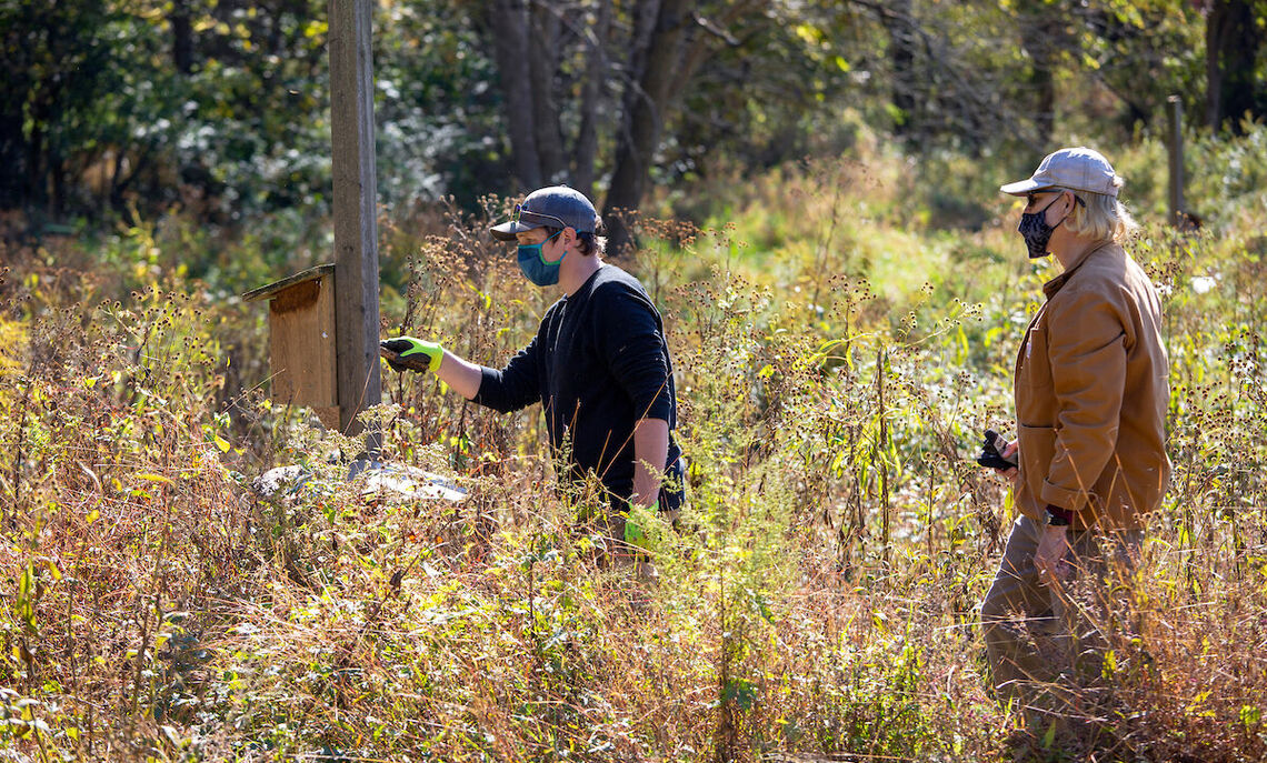 Nicholas J. Auwaerter '11, director for the Center For Sustainable Environment, leads a Spalding Conservatory clean-up.