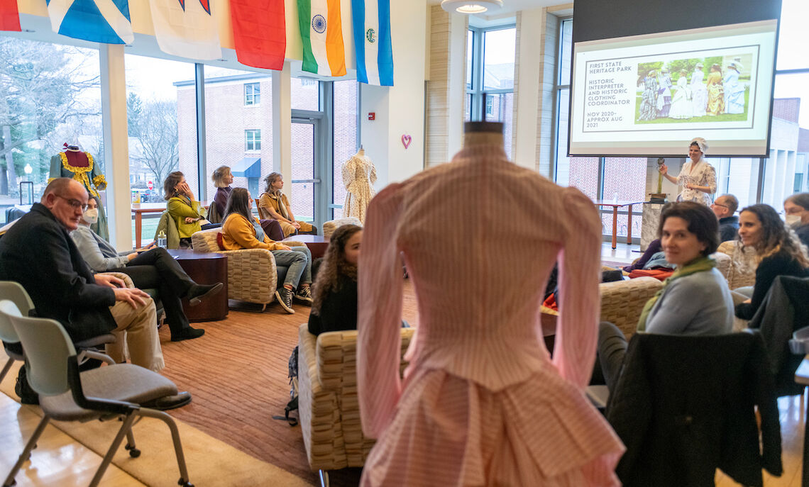 Rachel Sheffield '20, lead interpreter and historic clothing coordinator at First State Heritage Park in Dover, Del., presented her designs to students in Brooks College House.