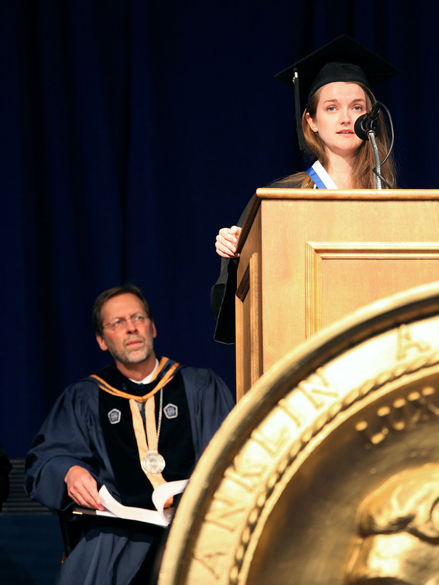 Williamson Medal winner Morgan Kincade '16 speaks during Franklin & Marshall College's 2016 Commencement ceremony while President Daniel R. Porterfield looks on.