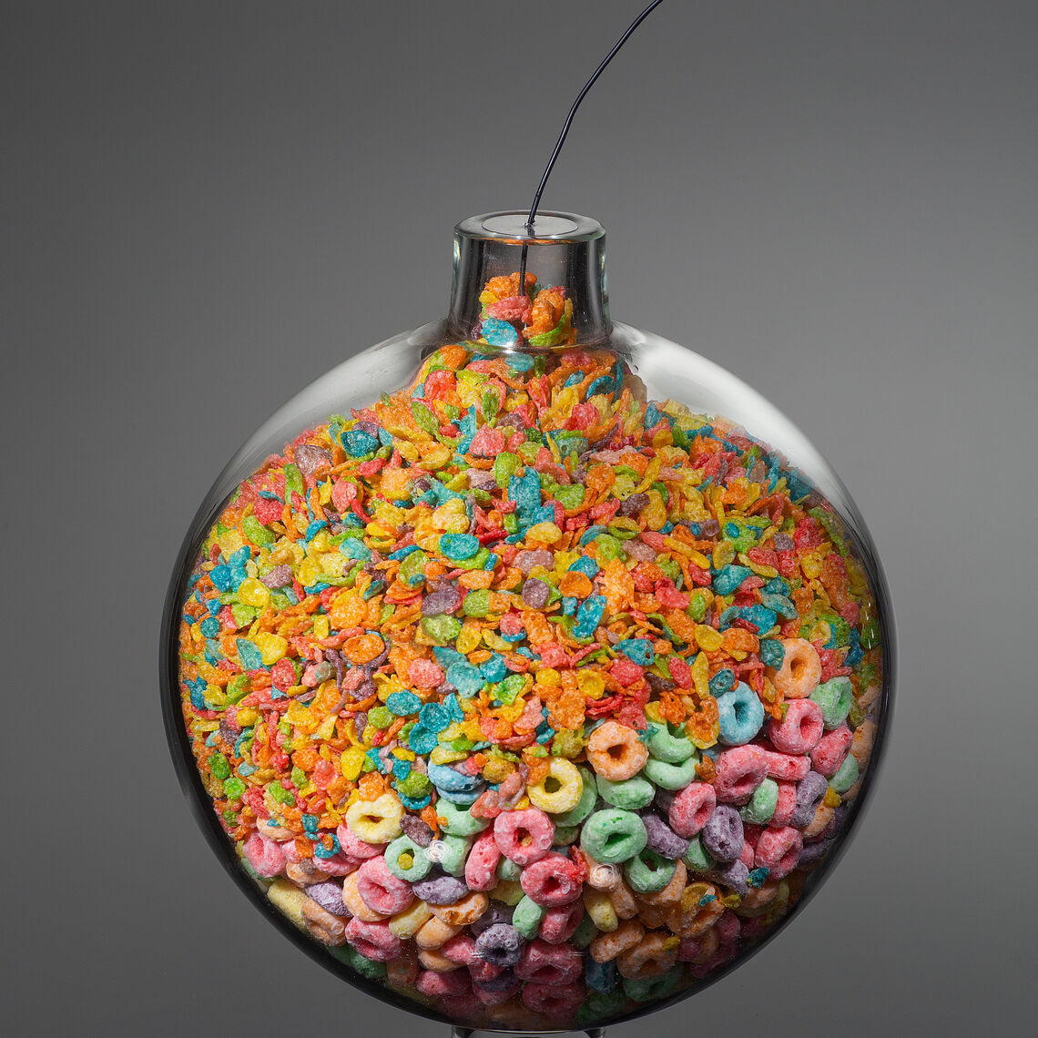 Froot Loops and Pebbles, 2019. Glass, candy, and string
