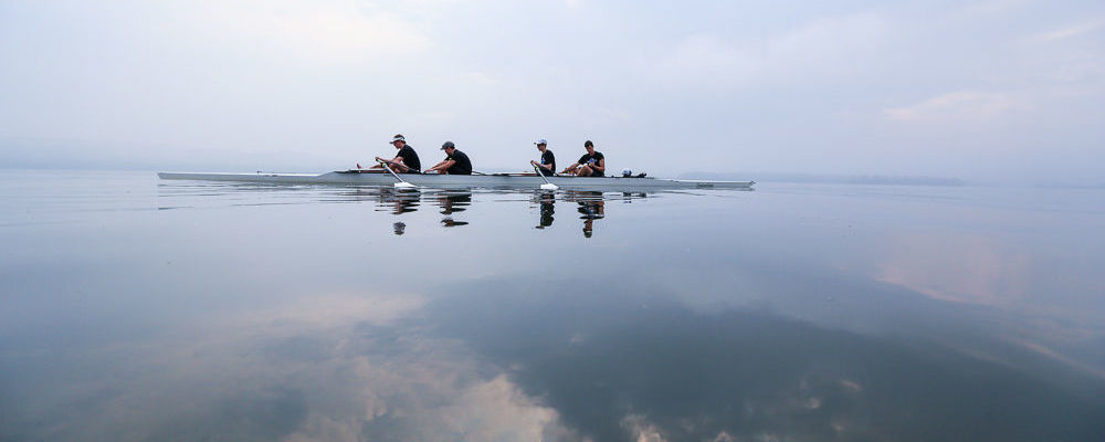 The men's team pauses for a rest during a still moment on the water during an early morning practice on the Susquehanna River. Pictured (l-r) are James Nelson '17, Jonathan Munro '17, Samuel Alter '15, Timothy Smith '15 and Amanda Levit '15.