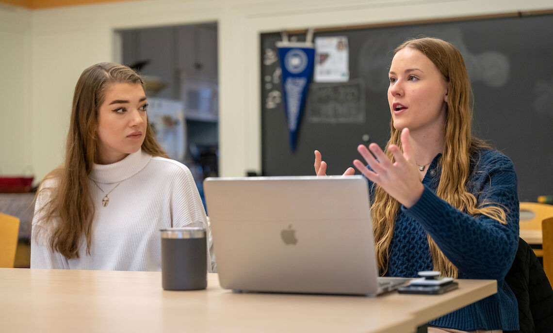 Erin Maxwell '23 and Liz Joslin '24 discuss November 2022 midterm election results at an F&M Votes debrief meeting.