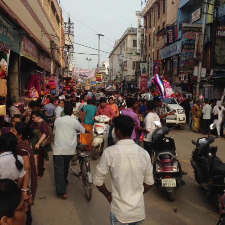 crowded market street varanasi