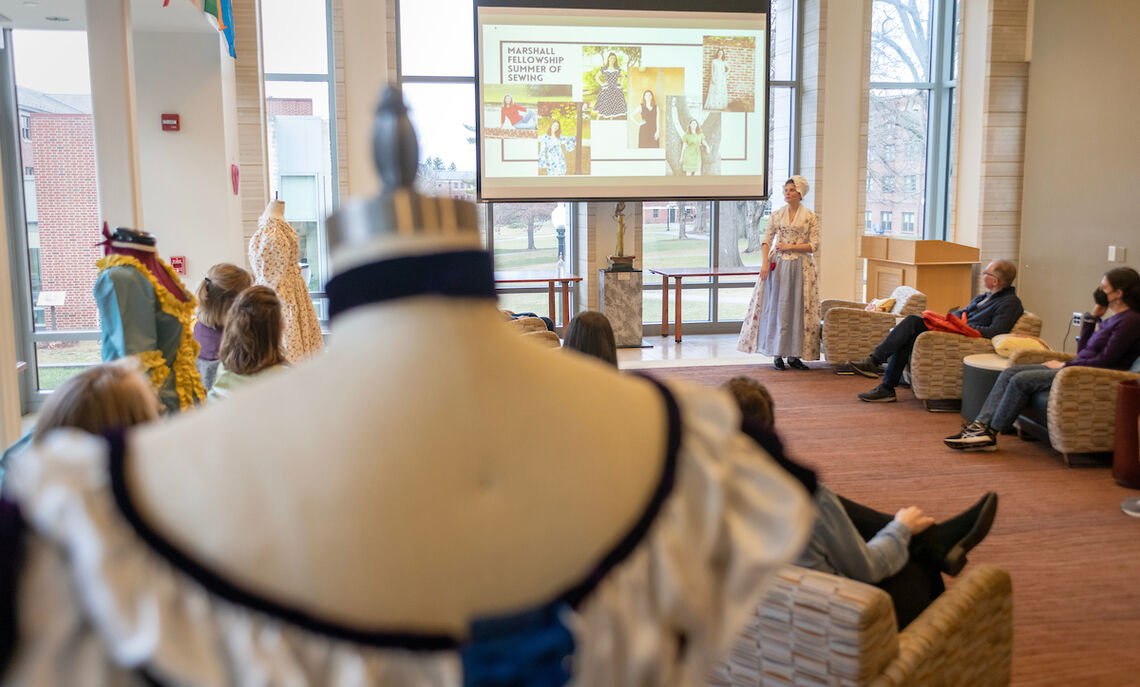 Rachel Sheffield '20, lead interpreter and historic clothing coordinator at First State Heritage Park in Dover, Del., presented her designs to students in Brooks College House.