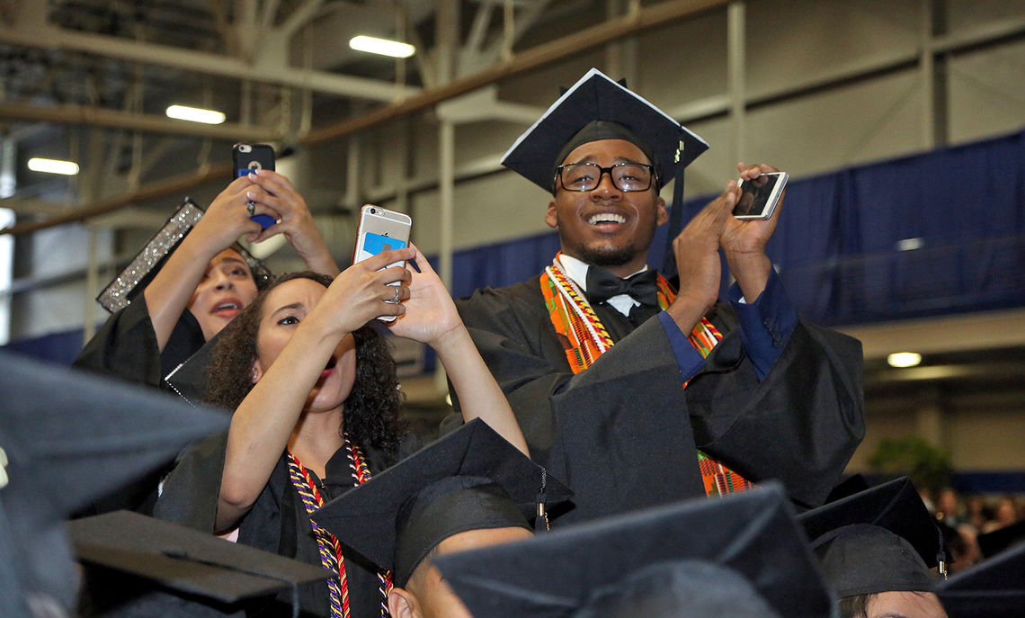 Exuberant members of F&M's Class of 2017 snap photos of their friends receiving their diplomas during the May 13 Commencement ceremony.