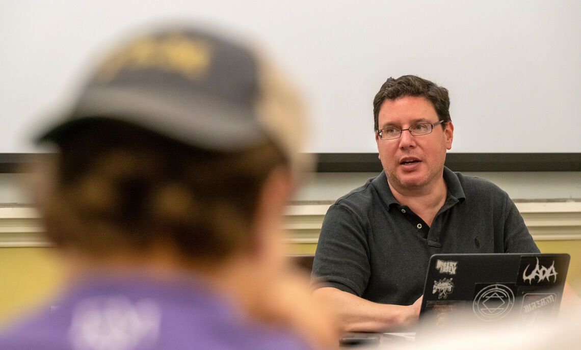 Professor of Marketing Jeffrey Podoshen teaches his Death, Horror and Humanity Connections course in the seminar room of Roschel College House.