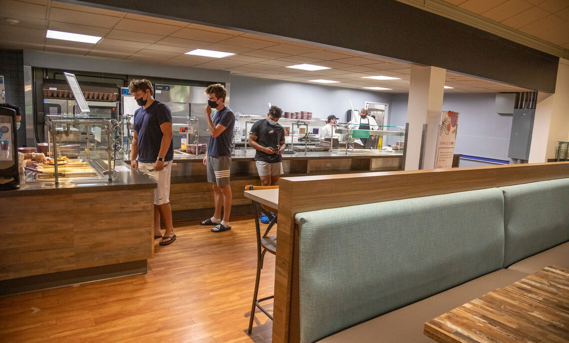 Students line up for a plate at the Simply Servings station, where staff have eliminated eight of the nine most common food allergens.