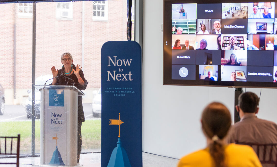 President Barbara Altmann speaks at the blended in-person and virtual champagne toast celebrating the opening of the Susan and Benjamin Winter Visual Arts Center at Franklin & Marshall College.