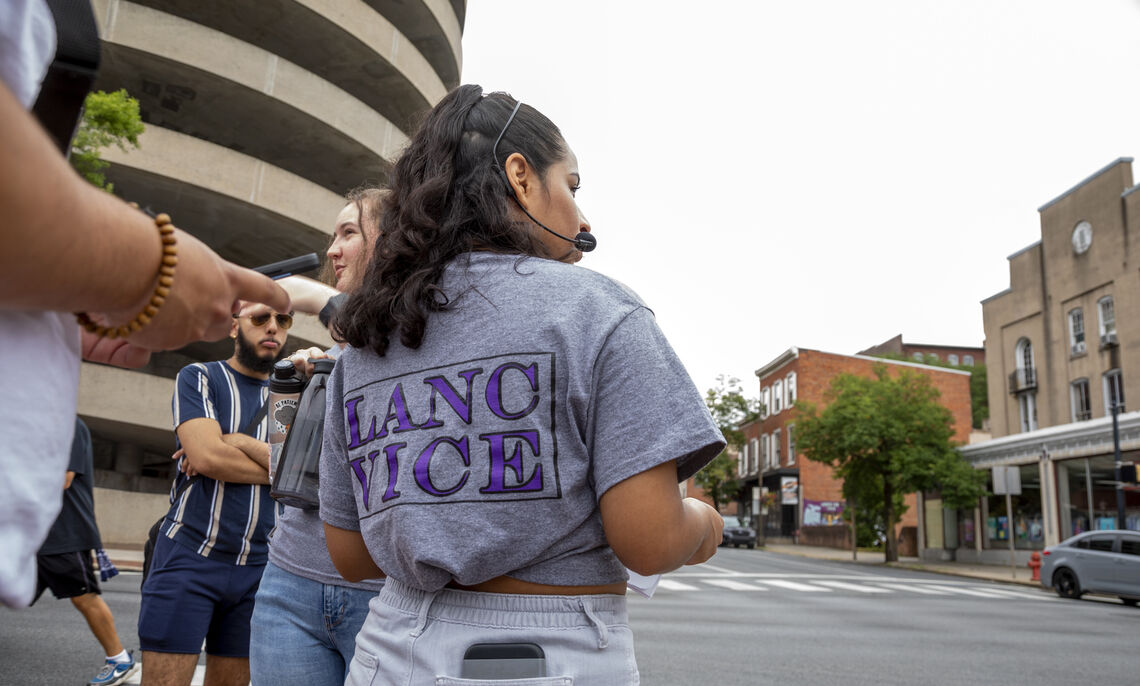 Maria Leon Reyes '23 guides a tour of Lancaster Vice History. A group of students is researching 1900s reform group efforts to curb prostitution, gambling and liquor law violations in downtown Lancaster.