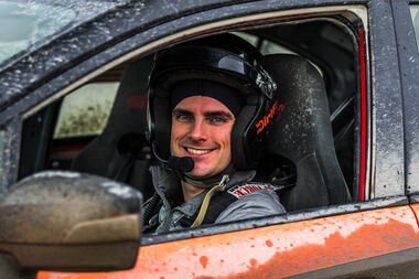 Greg Duckloe '13 during a staging stop while driving a heavily modified Subaru WRX STI at DirtFish, a rally school in Snoqualmie, Wash.