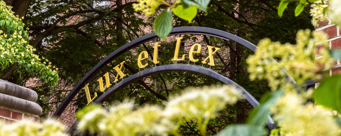 Lux et Lex arch on campus in May.