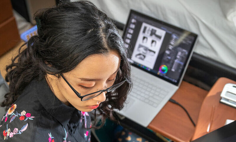 Sojin Shin working on her graphic novel, “Me, Nara, and Natasha.”