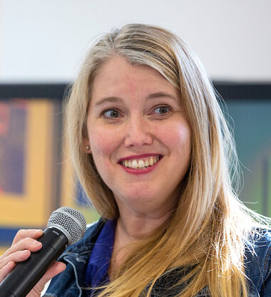 "I learned critical thinking and compassionate response on this campus," said Sarah Pharaon '00,  shown at a previous campus event.