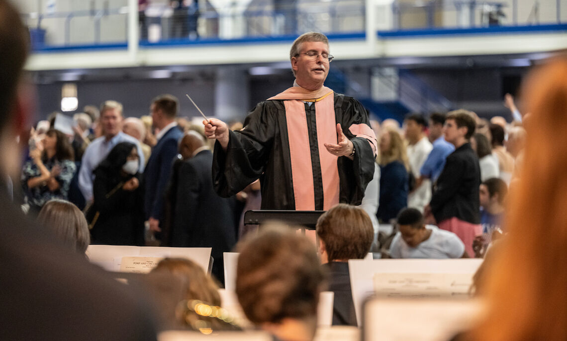 Brian Norcross conducts the student orchestra at F&M Class of 2023 Commencement.