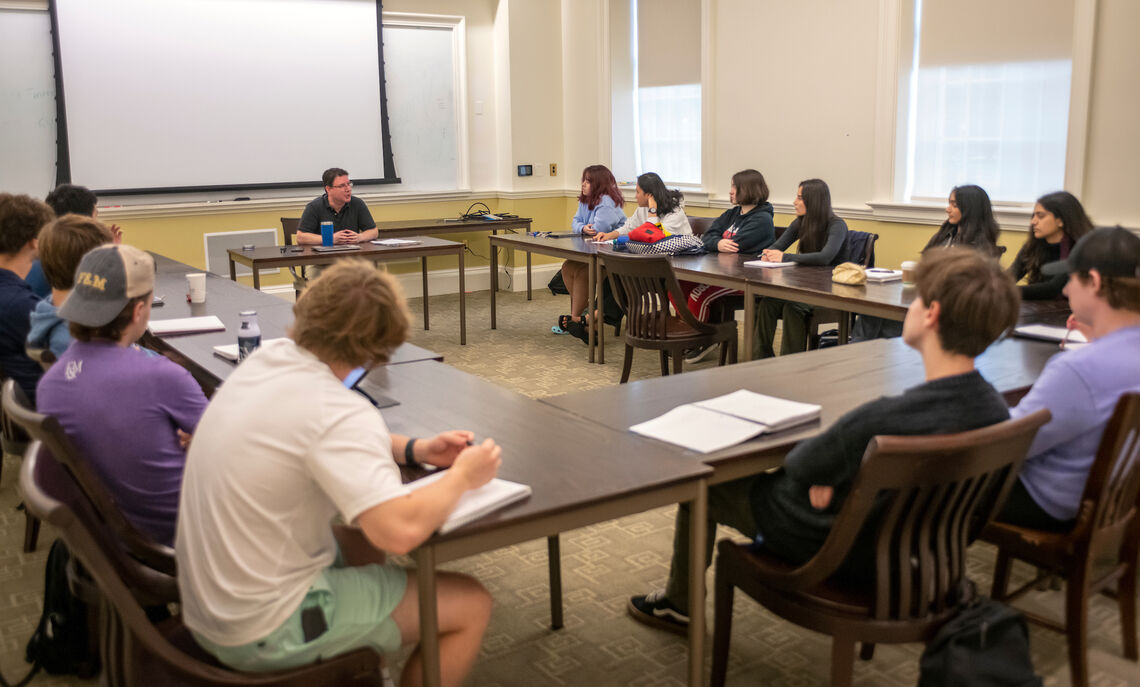 Professor of Marketing Jeffrey Podoshen teaches his Death, Horror and Humanity Connections course in the seminar room of Roschel College House.